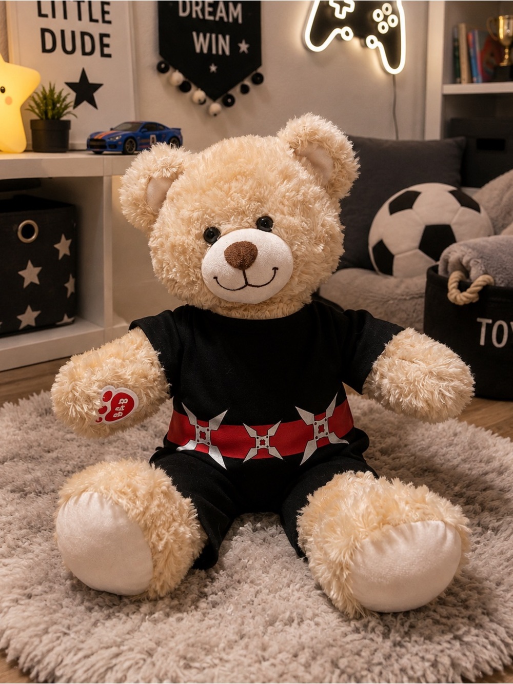 A-Bear teddy bear wearing a black ninja-style outfit